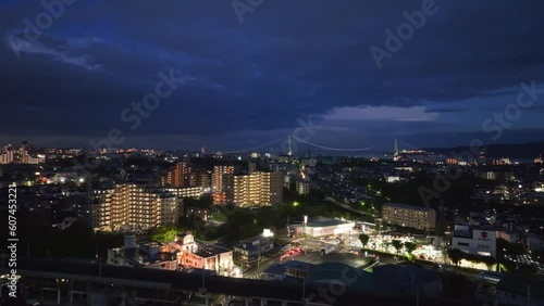 Wallpaper Mural Bright lights from cars and buildings at intersection in small city at night Torontodigital.ca