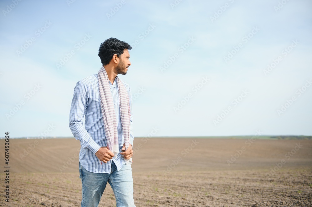 Young Indian farmer in his field Young Indian farmer in his field
