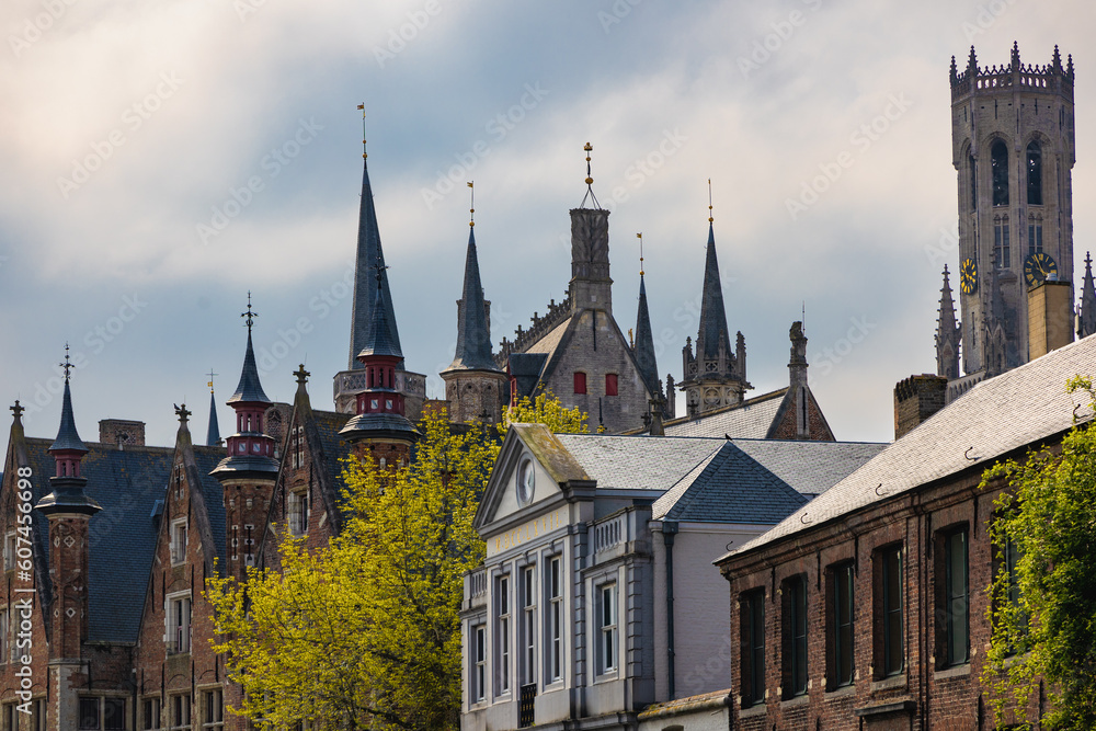 Fototapeta premium View of the roofs of the houses in the historic center of Bruges, with a good number of pointed towers.