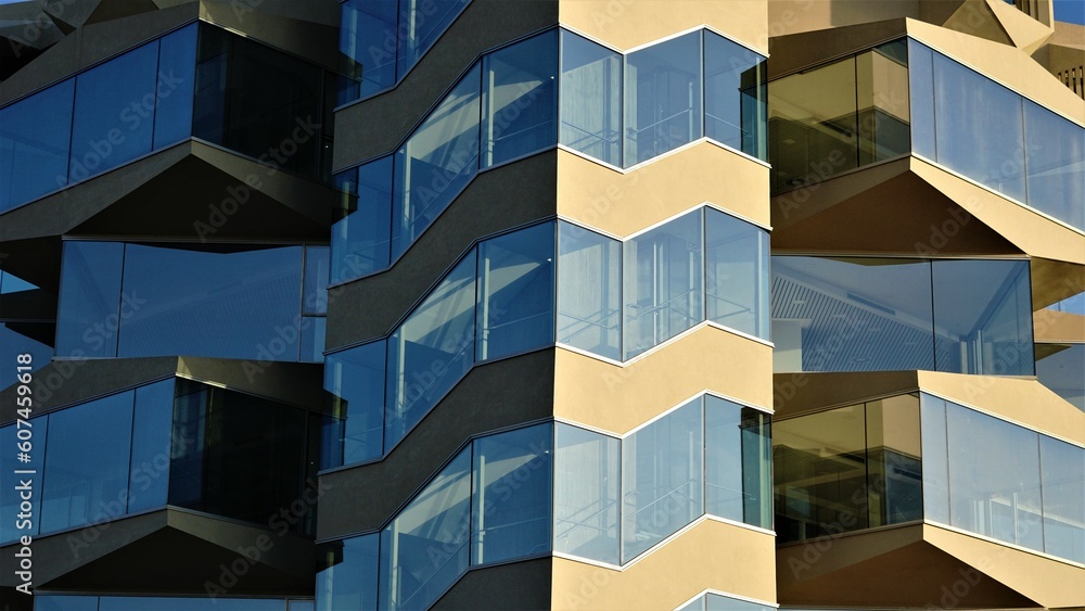 corner of building with glass facade corner of building with glass facade