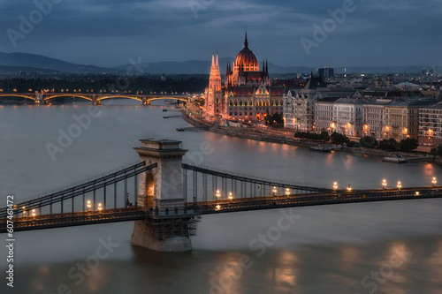 The magnificent Hungarian Parliament building on the banks of the Danube River. The majestic monumental building at night. Beautiful lighting.