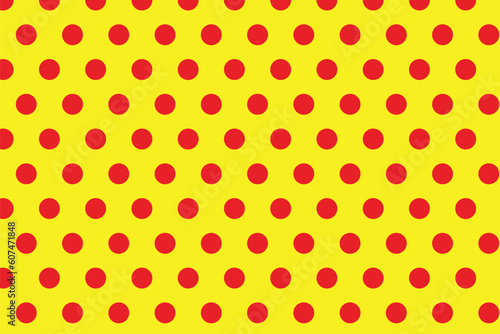 simple abstract seamlees red polka dot pattern on yellow background