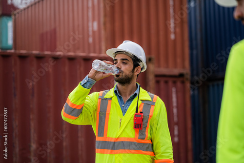 Container workers drinking water