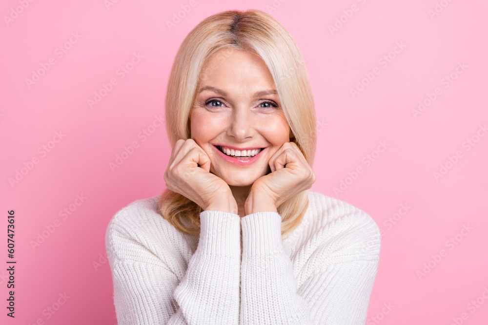 Photo of positive lovely lady beaming smile arms touch cheekbones isolated on pink color background - obrazy, fototapety, plakaty 