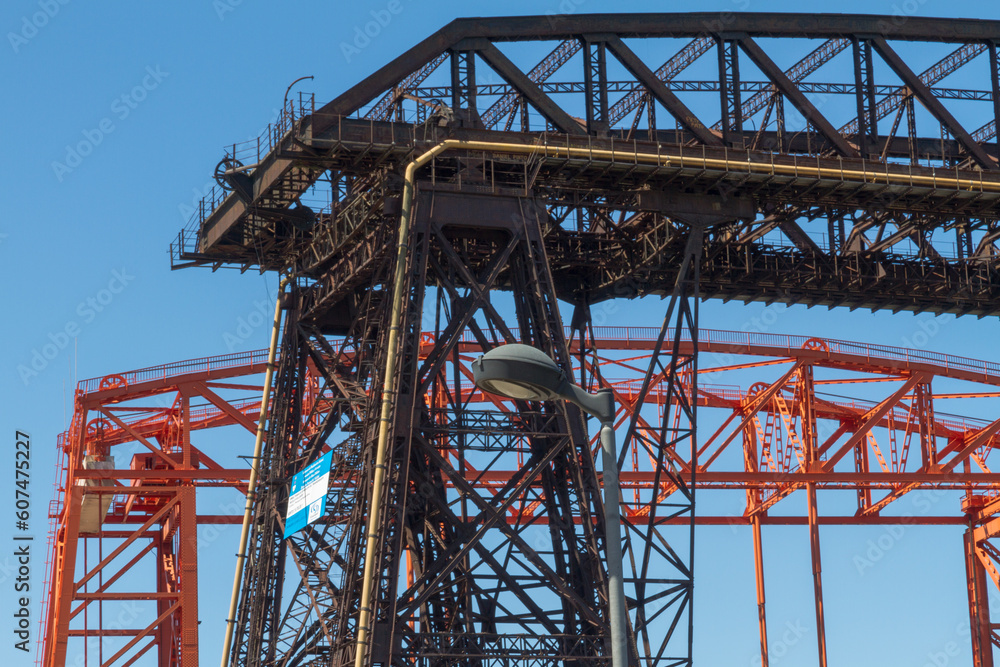 Ferry Bridge in the neighborhood of La Boca in the old port of Buenos Aires Argentina facing the Rio de la Plata and the Riachuello. Ferry Bridge in the neighborhood of La Boca in the old port of Buenos Aires Argentina facing the Rio de la Plata and the Riachuello.