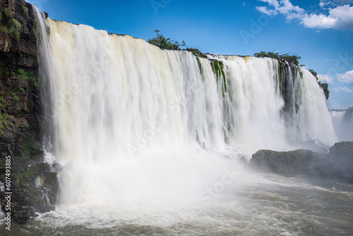 The Iguazu Falls surrounded by lush rainforests teeming with life provide a glimpse into
