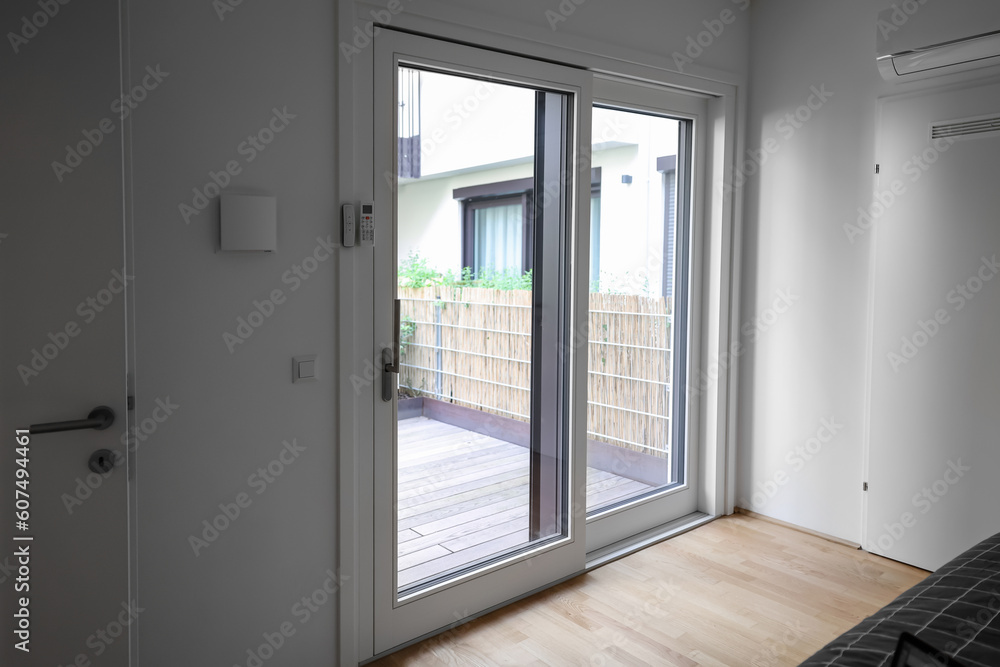 Fototapeta premium Big glass door in light room