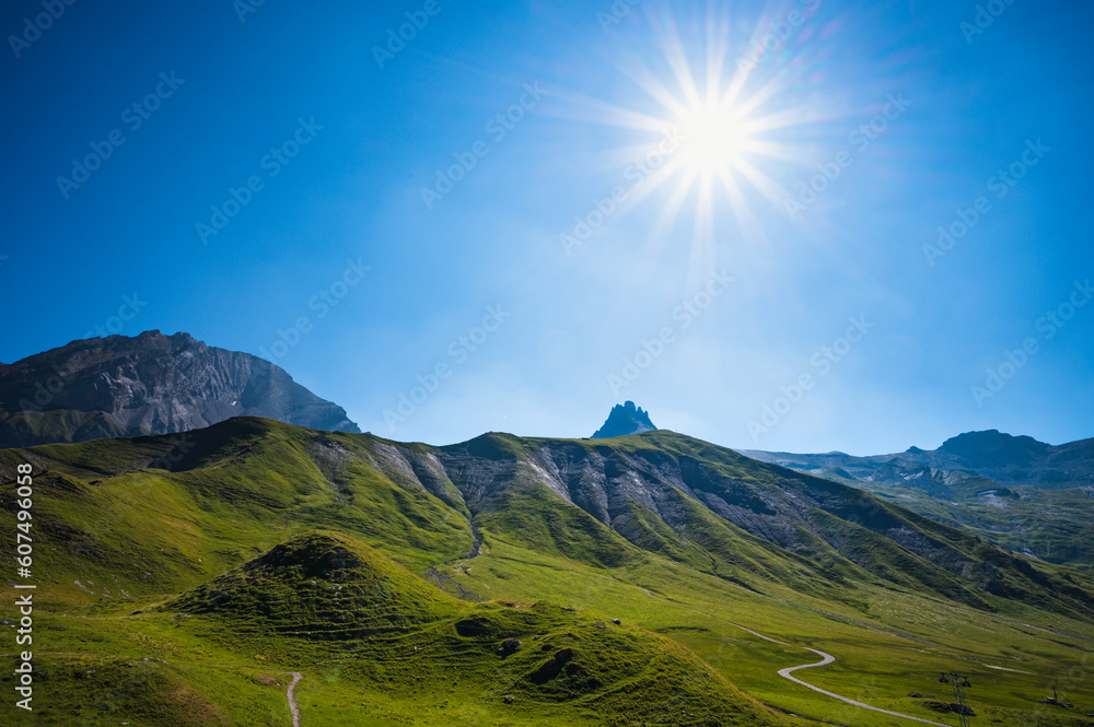 Obraz premium Bern, Switzerland - July 25, 2022 - View of Engstligenalp from the Engstligengrat hiking trail, Swiss Alps, Switzerland
