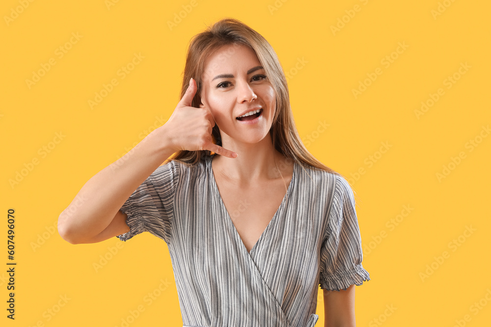 Beautiful woman in striped dress showing Beautiful woman in striped dress showing