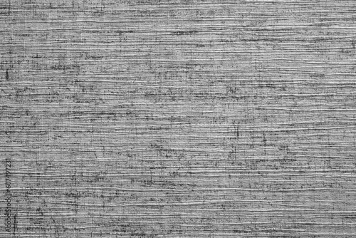 vinyl texture. striped surface of gray paper wallpaper. black and white photography