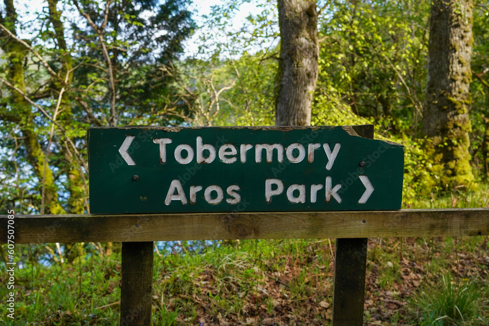 signpost with directions in Aros Park near Tobermory on the Isle of Mull. Aros Park is a woodland on the hebridean island Mull signpost with directions in Aros Park near Tobermory on the Isle of Mull. Aros Park is a woodland on the hebridean island Mull