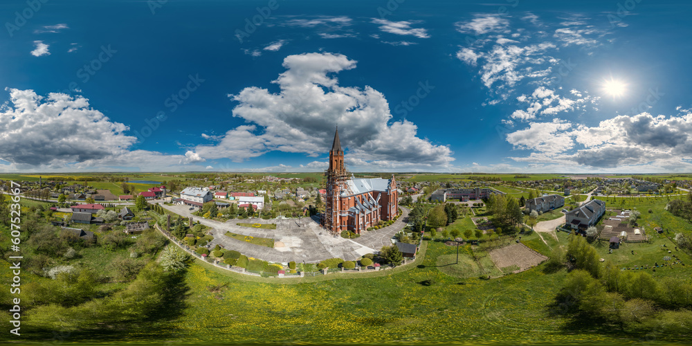 full hdri 360 panorama aerial view on red brick neo gothic catholic church in countryside or village in equirectangular projection with zenith and nadir. VR  AR content