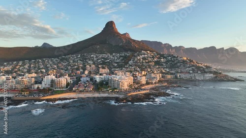 Aerial view of Atlantic Seaboard sunset with Lion’s Head Mountain, Bantry Bay and Sea Point from Atlantic Ocean, Cape Town, South Africa.