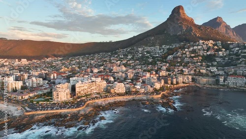 Aerial view of Atlantic Seaboard sunset with Lion’s Head Mountain, Bantry Bay and Sea Point from Atlantic Ocean, Cape Town, South Africa.