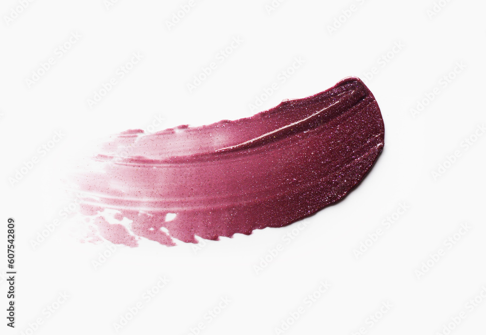 Lipstick lip gloss or balm cherry red colored abstract strokes smudge  background texture white colored isolated