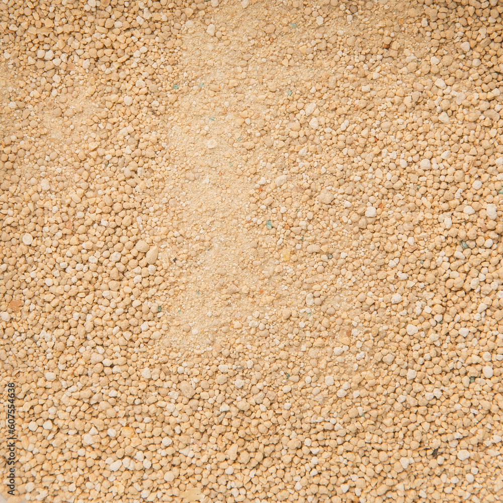 Cat Tray Filler Made of Bentonite. Falling Particles of Gray Pet Litter. Rotation. Biofuel, Biofuels, Eco Fuels. Cat's Litter Box Cat Tray Filler Made of Bentonite. Falling Particles of Gray Pet Litter. Rotation. Biofuel, Biofuels, Eco Fuels. Cat's Litter Box