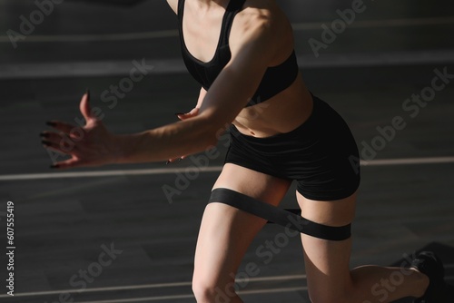 Close up image of attractive fit woman in gym.