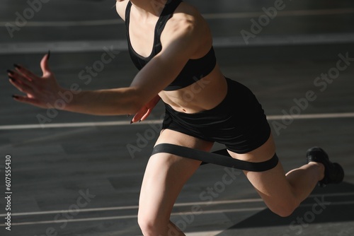 Close up image of attractive fit woman in gym.