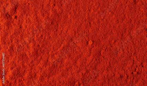 Fotografiet Red paprika powder background and texture