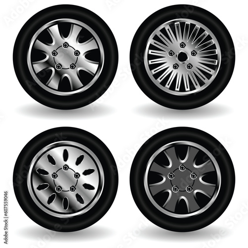 Different tyres and whells isolated over white background photo