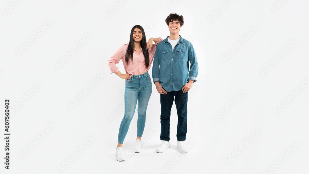 Happy Young Couple Posing Standing Over White Background, Full Length