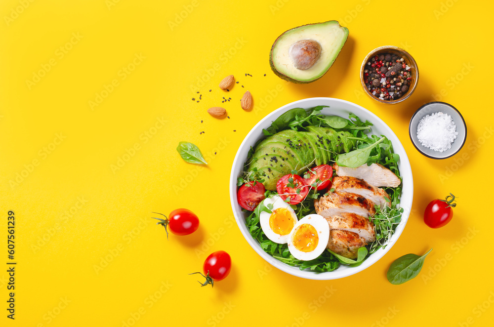 Grilled Chicken Fillet with Fresh Salad, Cherry Tomatoes, Boiled Egg and Avocado, Budha Bowl, Keto Paleo Diet Menu - obrazy, fototapety, plakaty 