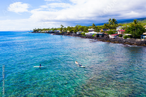 Aerial View: Surfers Anticipating Epic Waves in Kona