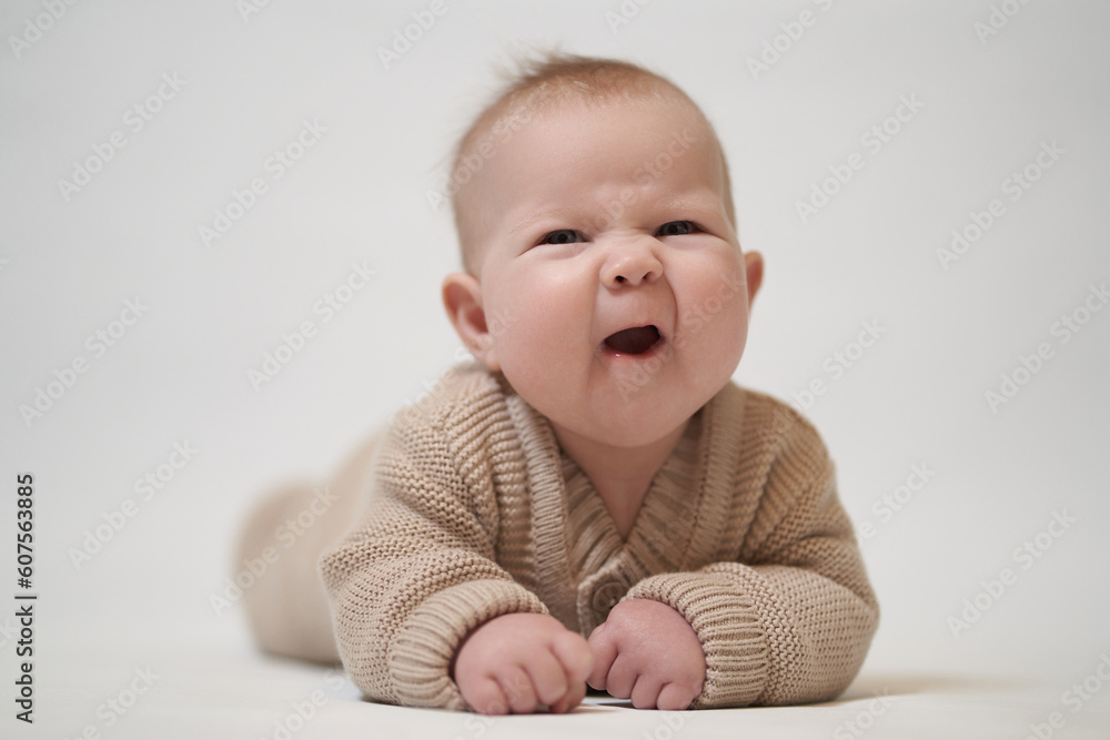 portrait of a newborn baby, on a light background portrait of a newborn baby, on a light background