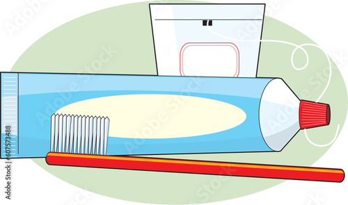 A tube of toothpaste, a toothbrush and some floss