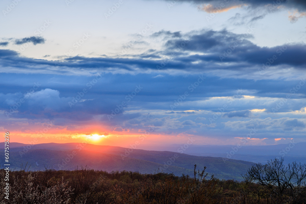 Sunset over Blue Ridge Mountains with heavy clouds
