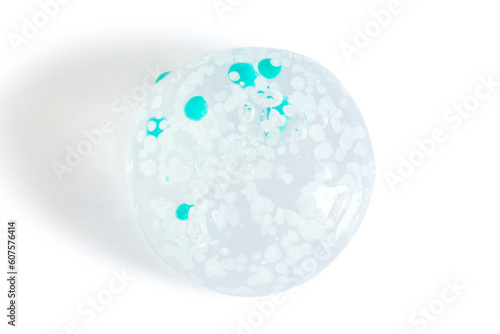 smears and drops of transparent gel with blue granules. On a blank background. PNG