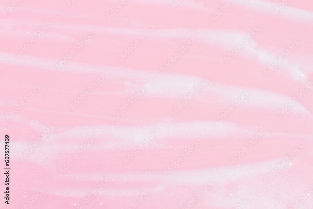 Smeared greasy melting cream. On a pink background. Smeared greasy melting cream. On a pink background.