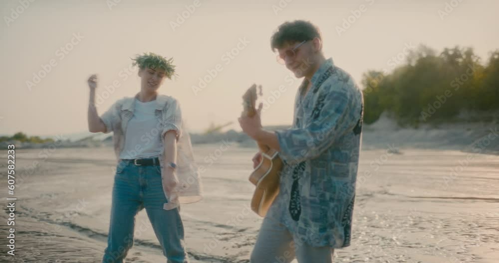 Guitarist Playing Guitar Outdoors Woman Dancing Guitarist Playing Guitar Outdoors Woman Dancing