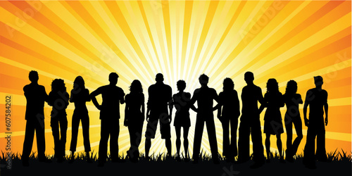 Huge group of people against a sunset sky