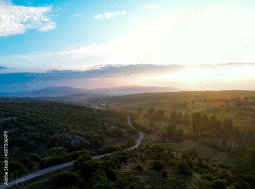 aerial photo at sunrise in the forest