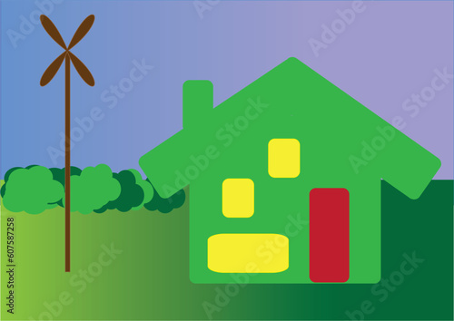 enviromentaly friendly green house with own windmill for electricity photo