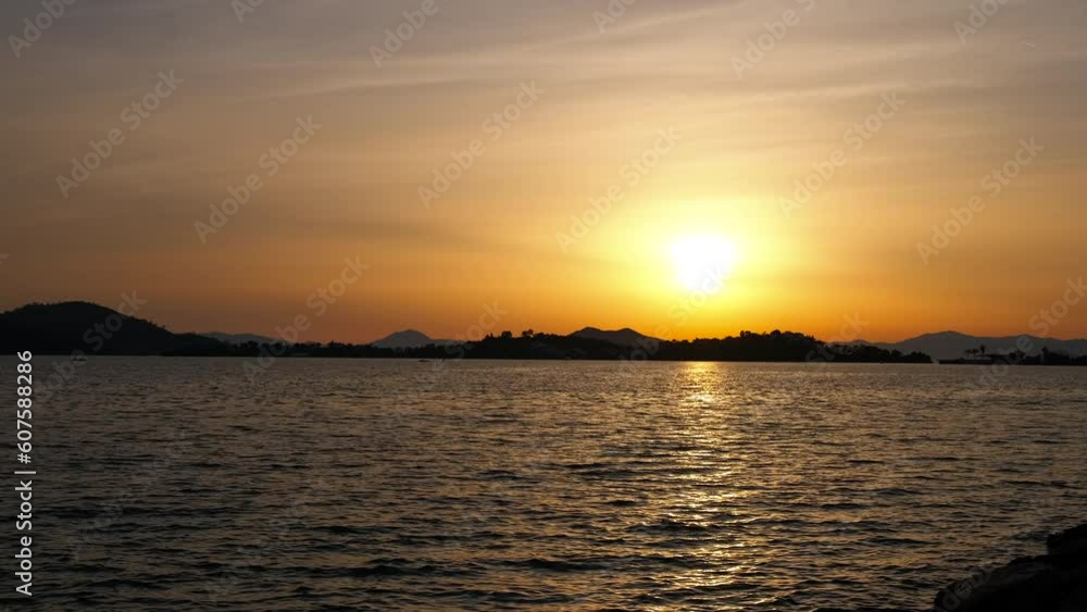 The setting sun over the sea bay. The setting sun over the sea bay.