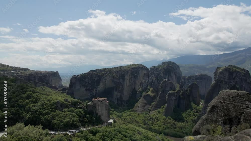 Aerial view of the Holy Monastery of Rousanos with natural rounded pillars rocks in Meteora region, Trikala, Thessaly, Greece. Aerial view of the Holy Monastery of Rousanos with natural rounded pillars rocks in Meteora region, Trikala, Thessaly, Greece.