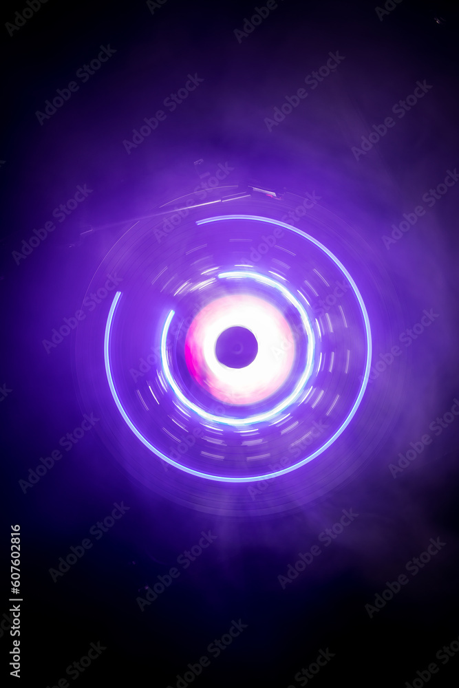Music Dj concept. Trail of fire and smoke on vinyl record. Burning vinyl disk. Turntable vinyl record play Selective focus Music Dj concept. Trail of fire and smoke on vinyl record. Burning vinyl disk. Turntable vinyl record play Selective focus