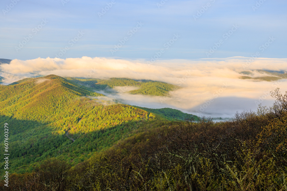 View of spring Blue Ridge Mountains and valley with low-lying clouds