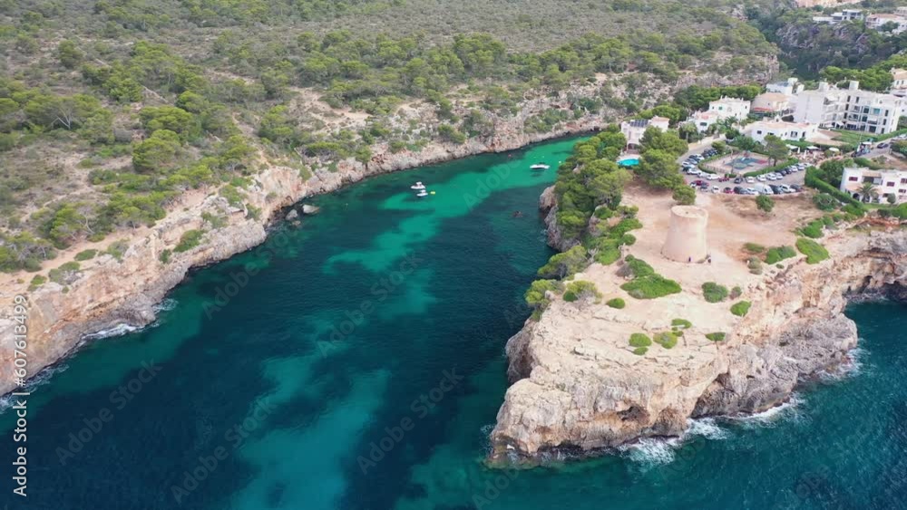 Aerial view of Torre de Cala Pi along the high cliffs coastline in Mallorca, Balearic Islands, Spain. Aerial view of Torre de Cala Pi along the high cliffs coastline in Mallorca, Balearic Islands, Spain.