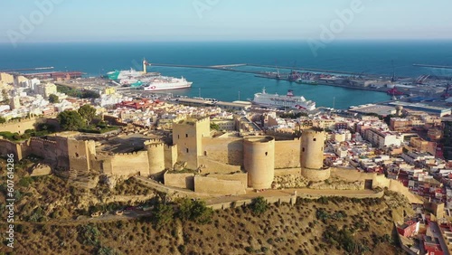 Aerial view of the Muralla de Jairan, a fort surrounded by walls on hilltop in Almeria, Spain.