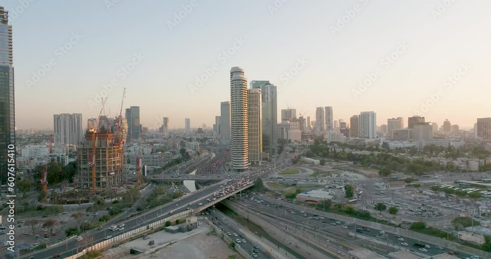 Aerial view of a highway in a city with traffic jam, Tel Aviv, centre district, Israel. Aerial view of a highway in a city with traffic jam, Tel Aviv, centre district, Israel.