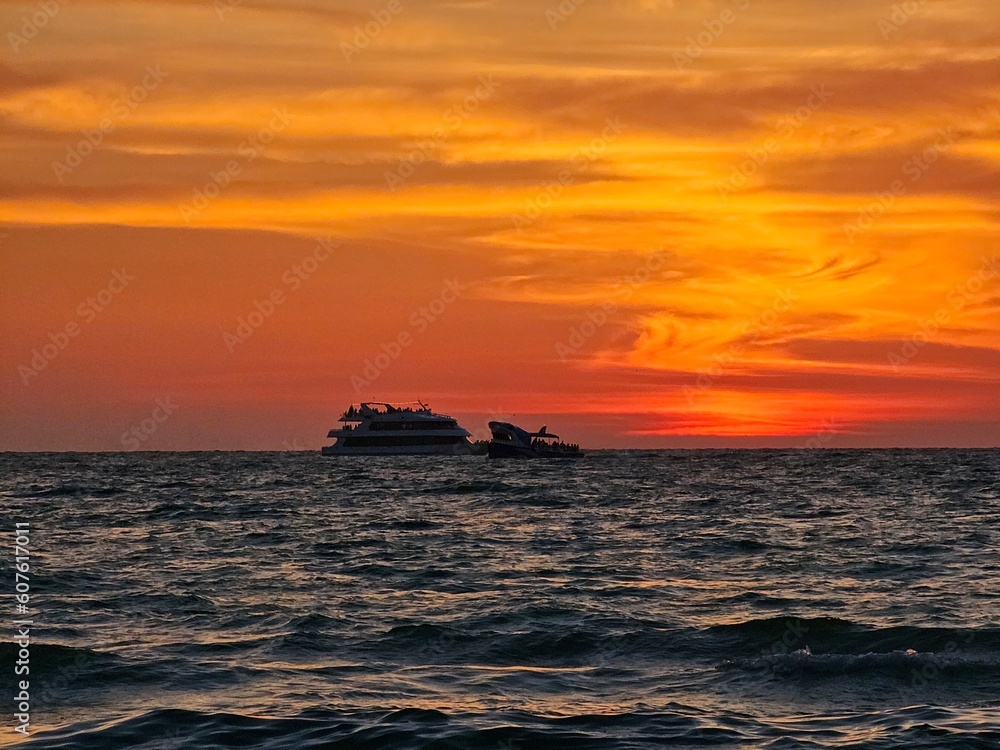 Sunset in Gulf of Mexico with 2 boats, Clearwater
