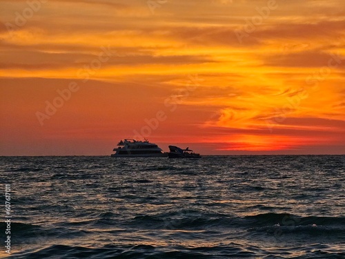 Sunset in Gulf of Mexico with 2 boats  Clearwater