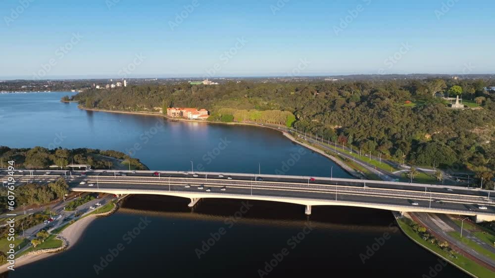 Aerial view of vehicles crossing the Swan river on Narrow bridge in Perth, Western Australia, Australia. Aerial view of vehicles crossing the Swan river on Narrow bridge in Perth, Western Australia, Australia.