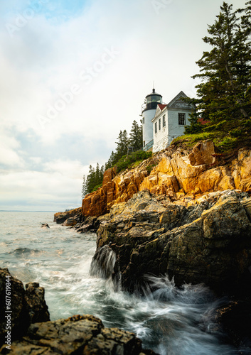 Lighthouse on the coastal cliff. Dramatic seascape with Bass Harbor Head Light Station in Tremont  Acadia National Park  Maine