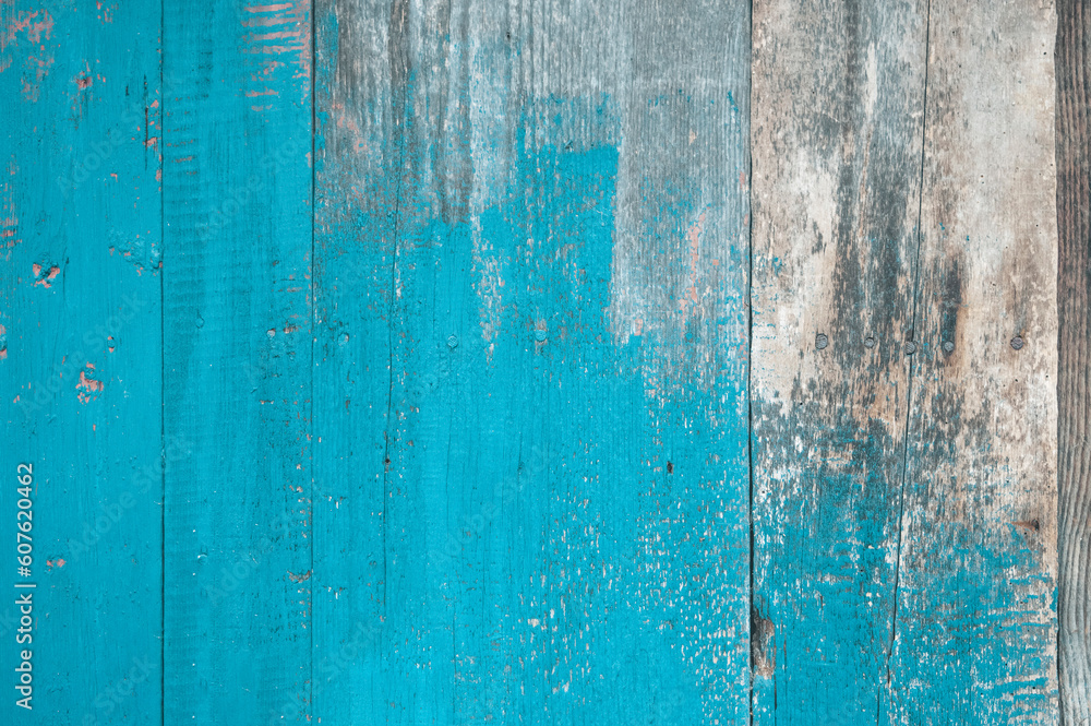 Brown boards. delaminated paint on wooden background. Wooden texture background with old paint peels.Shabby wooden wall Brown boards. delaminated paint on wooden background. Wooden texture background with old paint peels.Shabby wooden wall