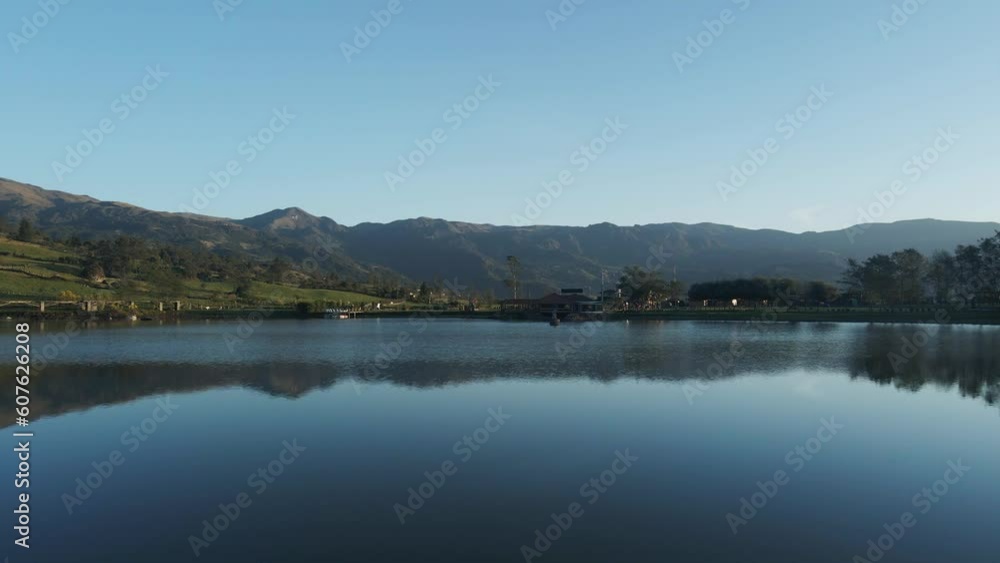 Aerial forward flight over peaceful Laguna de Busa Lake in Ecuador Aerial forward flight over peaceful Laguna de Busa Lake in Ecuador