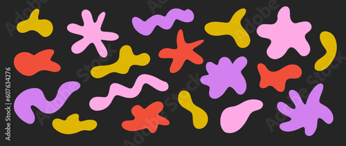 Abstract irregular shapes set. Bright liquid organic blobs on dark background. Random amorphous blots, clouds, bubbles and waves element collection for banners, posters, collages. Vector pack.